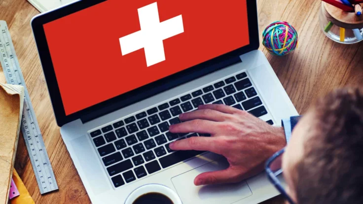 Drapeau suisse affiché en plein écran sur un ordinateur